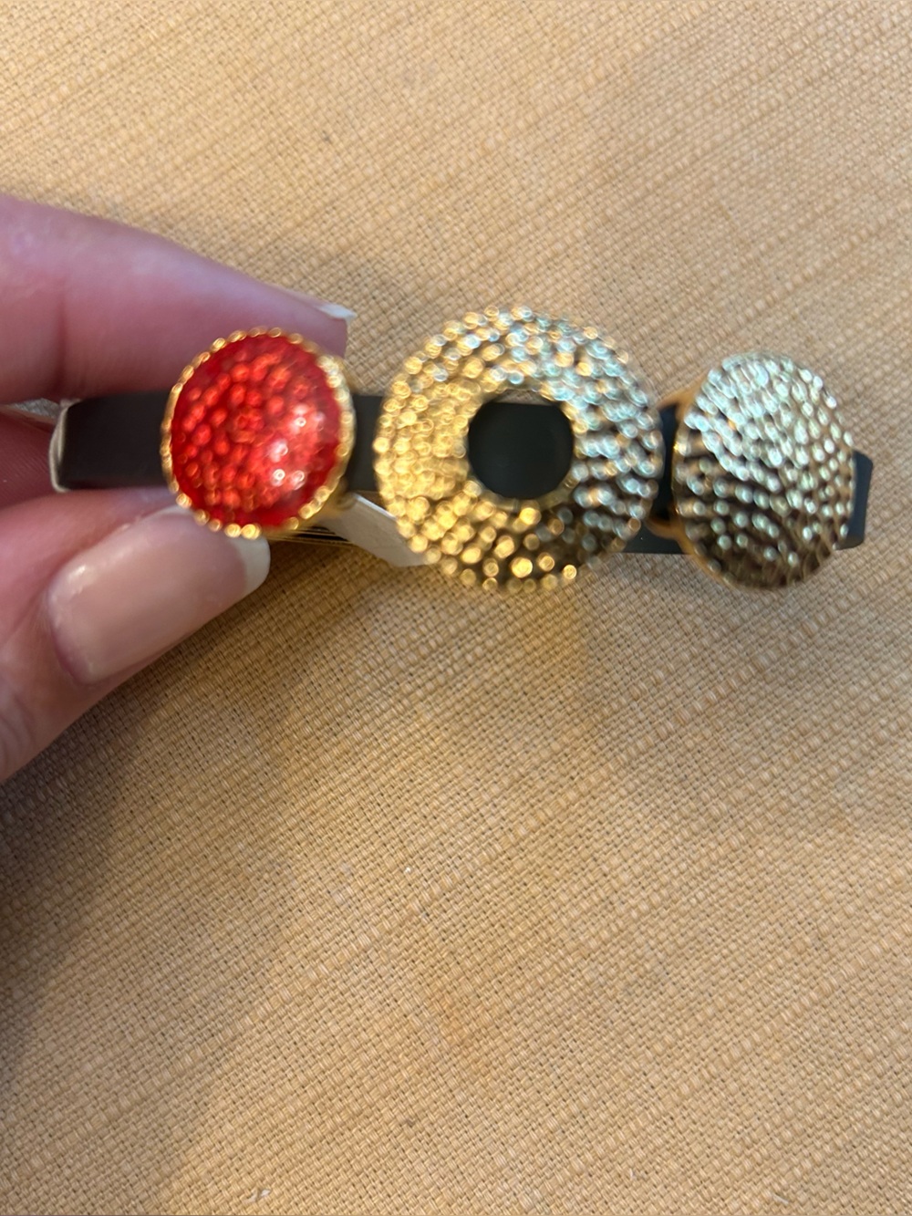 Nina Ricci Black Bracelet with Gold Accents